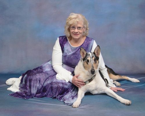 Me in a worship dance garment with my guide dog, Rosie